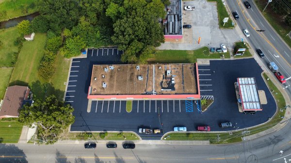 Aerial before and after photos. - These are some before, and after aerial photos of some residential driveways and commercial parking lots.