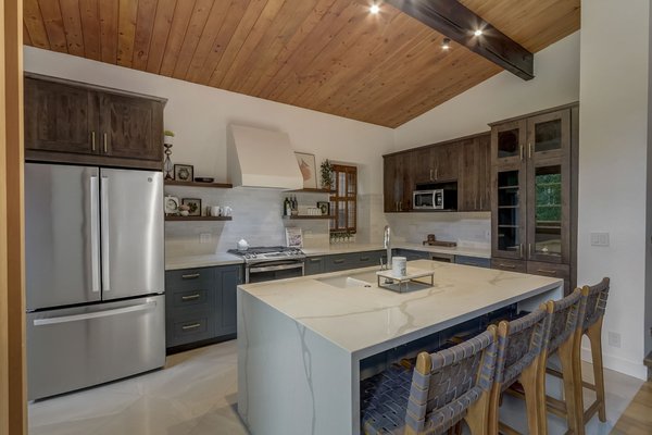 Beautiful Kitchen Remodel - This remodel required removal of one wall and a complete rearrangement of space to create a luxurious kitchen with an open floor plan. Beautiful Kitchen Remodel - This remodel required removal of one wall and a complete rearrangement of space to create a luxurious kitchen with an open floor plan.