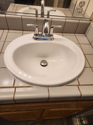 Bathroom sink - We remove old sink and replaced it with a new sink and new faucet. Bathroom sink - We remove old sink and replaced it with a new sink and new faucet.