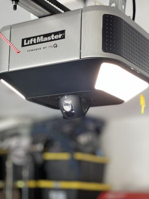 Garage Door / Automatic Garage Door Opener Replacement - Installation - A client in Roseville had a damaged garage door and old garage door opener that didn’t work. 

We replaced his garage door with a new 24 gauge almond short panel garage door, and liftmaster belt driven garage door opener