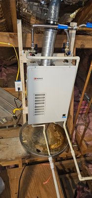 New tankless water heater - This customer had a water heater from the 90's in their attic that was full of sediment and no longer creating good hot water. The burner was on all the time and was going to cause much larger problems. We came to the rescue and solved that problem!! New tankless water heater - This customer had a water heater from the 90's in their attic that was full of sediment and no longer creating good hot water. The burner was on all the time and was going to cause much larger problems. We came to the rescue and solved that problem!!