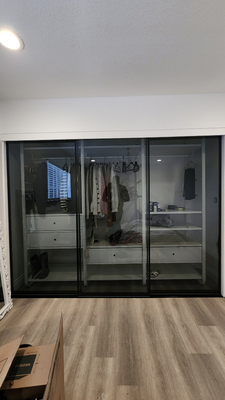 Custom Glass Closets - Elevate your living space with our stunning custom sliding closets, offering both beauty and practicality. We provide a wide variety of luxurious closet styles, including white glass, black glass, mirrors, wood, and more. Tailored to your exact specifications, our closets seamlessly integrate with your interior design while offering functional storage solutions. Custom Glass Closets - Elevate your living space with our stunning custom sliding closets, offering both beauty and practicality. We provide a wide variety of luxurious closet styles, including white glass, black glass, mirrors, wood, and more. Tailored to your exact specifications, our closets seamlessly integrate with your interior design while offering functional storage solutions.