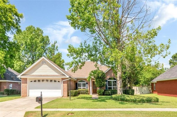 Sold for 275,000 l 2230 Cresting Court Mobile AL, 36695 l Helped buyer relocate from Miami to Mobile. Welcome to Mobile!! - UPDATES and LOCATION! Updated bathrooms, new carpet in bedrooms, smoothed ceilings throughout the home and so much more. Welcome to this home with 4 bedrooms, 2 bathrooms plus an bonus/office area. Greet your guest in this generously sized foyer area. The living area offers trey ceilings, laminate wood flooring, corner fireplace with gas logs, lots of windows allowing in tons of natural lighting. The kitchen has tile flooring, granite counter tops, stainless appliances, pantry, lots of cabinets and counter space, and breakfast bar. Just off the kitchen is the attached dining room with bay windows overlooking the back patio and backyard. The primary suite is separated from the additional bedrooms. The primary or owner’s suite is spacious and offers tray ceiling. Adjoining the primary bedroom is an exceptionally large bathroom featuring a large dual vanity around with double sinks, lots of cabinets, counter space and drawers for storage, beautiful, updated tile walk-in shower with seat and hand/hold bar, double walk-in closets, raised ceilings and skylights for tons of natural lighting. The additional bedrooms are nicely sized with great closets. The hallway bathroom has been updated with a fabulous walk-in tiled shower. The bonus room which is secluded from the rest of the home with private access. The bonus area could be used as an office, playroom, craft room, man cave, and so much more. Just off the back of the house is an attached porch perfect for barbeques, entertaining family/friends or just relaxing after a long day. The yard is spacious and completely fenced with privacy fence. In addition to all these amenities, the home has a garage that is ready for your vehicle and storage of your lawn equipment, plus a shed in the backyard. Let’s make this home your family’s “New Beginning”.