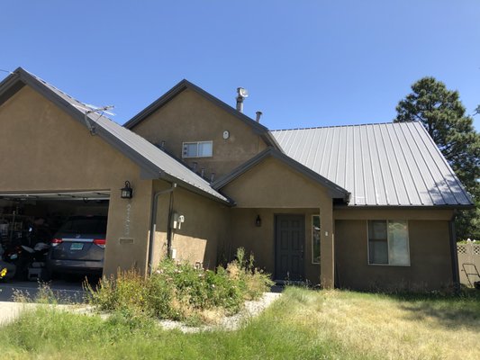 New metal roof installed - Here is a view of a new metal roof that has been installed. New metal roof installed - Here is a view of a new metal roof that has been installed.
