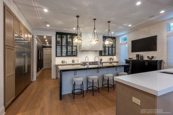 Champion's Retreat: A Stylish Transformation for the Modern Athlete - This remodel showcases a remarkable transformation achieved through collaboration with an excellent interior designer and a skilled contracting team. Designed for a professional athlete, the cabinetry Galleria Design Studio provided plays a pivotal role in this stunning home, striking the perfect balance between style and comfort. Our collaborative effort crafted a unique home that embodies a masculine touch while remaining inviting for entertaining guests. Every detail reflects functionality and aesthetic appeal, ensuring these spaces are not only a hub for gatherings but also a serene sanctuary for relaxation after a long day. The efficient execution of this project has truly brought the client's vision to life!