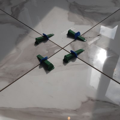 Installation of ceramic tiles - Installation of ceramic tiles on the floor in a new apartment Installation of ceramic tiles - Installation of ceramic tiles on the floor in a new apartment