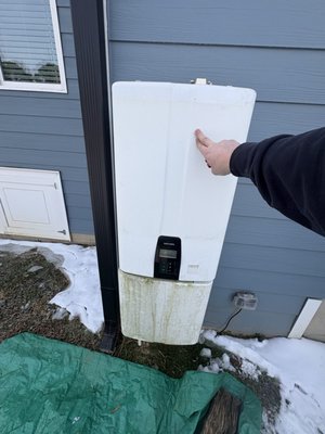 Tankless water heater replacement - This customer woke up to no hot water, upon inspection we found the Navien tankless had frozen solid in the extreme cold, unfortunately due to severe internal damage it was not salvageable so we replaced the unit with a new Rinnai RXP199 which has a built in recirculation pump which would turn on in cold weather to prevent this very thing from happening again. Tankless water heater replacement - This customer woke up to no hot water, upon inspection we found the Navien tankless had frozen solid in the extreme cold, unfortunately due to severe internal damage it was not salvageable so we replaced the unit with a new Rinnai RXP199 which has a built in recirculation pump which would turn on in cold weather to prevent this very thing from happening again.