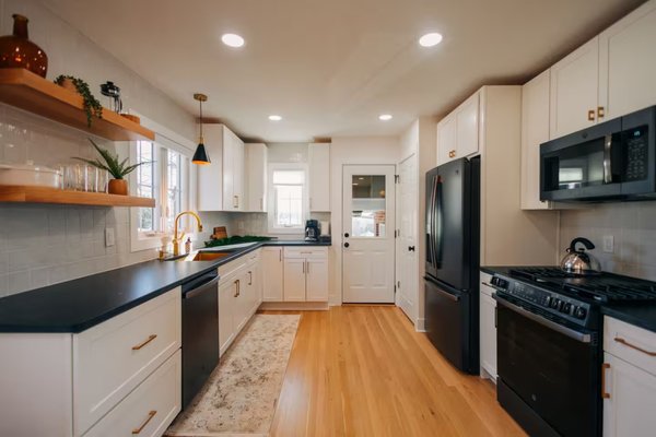 AirBnb Transformation - In 2024, we completed a full home remodel for an investor, transforming an outdated space with a brand-new kitchen, updated bathrooms, and vaulted ceilings. We refinished the original flooring to bring out its natural beauty and modernized the entire layout for maximum appeal and value.