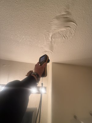 This is a water damage which came from the pipes in the ceiling above - Water damage from broken pipes in the ceiling cause damage to the bathroom. Before photos show what it looks like before all affected materials are removed. All studs are cleaned and treated with antimicrobial.