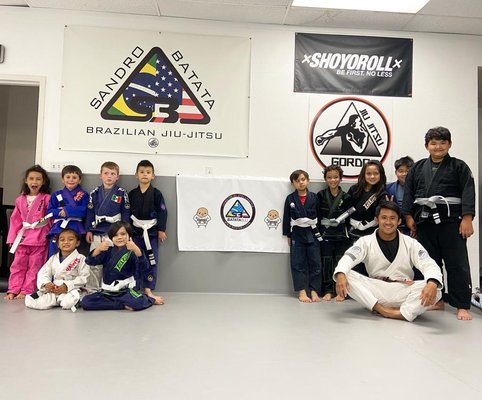 Kids class every Tuesdays & Thursday - Children of all ages 5-15 can learn valuable social and anti-bullying confidence through Martial Arts. Our curriculum focuses on fundamental skills and techniques of Brazilian Jiu Jitsu; but tailored into solo drills, team-building and competitive games to make it accessible and fun for kids. Kids class every Tuesdays & Thursday - Children of all ages 5-15 can learn valuable social and anti-bullying confidence through Martial Arts. Our curriculum focuses on fundamental skills and techniques of Brazilian Jiu Jitsu; but tailored into solo drills, team-building and competitive games to make it accessible and fun for kids.