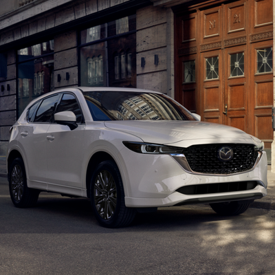The MAZDA CX-5 - With its exquisitely sculpted exterior and sophisticated interior space, the Mazda CX-5 feels like it’s tailored to you. Combined with our now standard i-Activ AWD® and increased horsepower available for turbo models, this CUV provides an elevated driving experience that invigorates both body and mind. The MAZDA CX-5 - With its exquisitely sculpted exterior and sophisticated interior space, the Mazda CX-5 feels like it’s tailored to you. Combined with our now standard i-Activ AWD® and increased horsepower available for turbo models, this CUV provides an elevated driving experience that invigorates both body and mind.