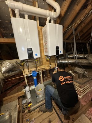 Tankless Installation - Replaced Two 50 Gal tanked water heaters for two Navien Tankless units. Tankless Installation - Replaced Two 50 Gal tanked water heaters for two Navien Tankless units.