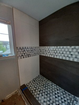 Bathroom Remodel 2021 - This remodel was done on a bathroom with basic amenities. We removed the bathtub and created a walk in shower. Bathroom Remodel 2021 - This remodel was done on a bathroom with basic amenities. We removed the bathtub and created a walk in shower.