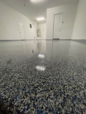 Epoxy Garage Flooring Phoenix - At Precision Garage Works®, it is our goal to transform your garage from the ordinary to the extraordinary. From our premium garage flooring, garage cabinets, garage wall organizers and car lifts / vehicle storage, we are ready to tackle your biggest projects.

Whether you need to get a little more garage organization or want to turn your old garage into a showroom, one call to Precision Garage Works will get the job done right and will stay looking great for years to come. We use only the best quality products and materials, then add in professional installation service for the best job every time.

We perform our own floor installations–we never hire out cheap labor or subcontractors.

Imagine an attractive garage floor that’s easy to clean and maintain, enhances lighting, and leaves you free from worry about stains or spills. Next, imagine that you can have this revolutionary new system installed in just one day, and drive on it the next!*

Precision Garage Works® system delivers all these advantages and more in our state-of-the-art Texas Select Floor Coating systems. We use polyurea/polyaspartic coatings which provide an industrial strength coating that is flexible and just about bullet proof! We speak with assurance when we say you are buying the very best flooring system available.

What’s the difference between a traditional epoxy or polyurethane floor system?
Answer: A traditional garage floor coating with epoxy doesn’t carry the UV stability or strength of an all polyaspartic floor coating system. The polyaspartic dries Harder, faster, and has top of the charts abrasion resistance. Using these products we offer our limited lifetime warranty that covers fading, delaminating, yellowing, and hot tire pick up. We stand behind our guarantee and put customer service first always.

Our high-performance polyurea/polyaspartic floor coating is superior to any other available technologies in terms of durability and performance over time. Precision Garage Works® flooring system is unique in that it is the only residential coating system that will not break down, delaminate or color fade due to UV exposure.