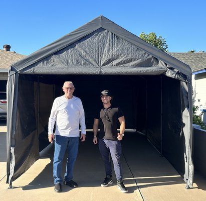Portable Carport Assembly and Anchoring to Concrete Driveway - This portable carport, ordered from Amazon, arrived in a flat box that seemed to contain an overwhelming number of pieces. The customer's motivation behind this purchase was the recent acquisition of a new car, which they wanted to protect from the harsh UV rays and intense heat here in The Valley.
Securing the carport to the concrete driveway was a top priority for the customer. They wanted a solution that would provide reliable protection and stability for their vehicle.
Budget was also a concern for the customer, especially when they received another quote for over $1,300 for a similar project. Our quote, coming in at nearly half the cost, was a pleasant surprise, demonstrating that quality could be affordable.
Moreover, our team's responsiveness was a key factor in the customer's satisfaction. We were able to schedule the installation just a few days after their initial inquiry, showing our commitment to meeting their needs promptly.
The highlight of this project was the speed and efficiency of the installation. In just one day, our dedicated team transformed a pile of components into a sturdy, well-anchored shelter, giving the customer reliable protection for their beloved Honda. The customer was extremely pleased with the outcome, appreciating our dedication to quality, affordability, and excellent service. Portable Carport Assembly and Anchoring to Concrete Driveway - This portable carport, ordered from Amazon, arrived in a flat box that seemed to contain an overwhelming number of pieces. The customer's motivation behind this purchase was the recent acquisition of a new car, which they wanted to protect from the harsh UV rays and intense heat here in The Valley.
Securing the carport to the concrete driveway was a top priority for the customer. They wanted a solution that would provide reliable protection and stability for their vehicle.
Budget was also a concern for the customer, especially when they received another quote for over $1,300 for a similar project. Our quote, coming in at nearly half the cost, was a pleasant surprise, demonstrating that quality could be affordable.
Moreover, our team's responsiveness was a key factor in the customer's satisfaction. We were able to schedule the installation just a few days after their initial inquiry, showing our commitment to meeting their needs promptly.
The highlight of this project was the speed and efficiency of the installation. In just one day, our dedicated team transformed a pile of components into a sturdy, well-anchored shelter, giving the customer reliable protection for their beloved Honda. The customer was extremely pleased with the outcome, appreciating our dedication to quality, affordability, and excellent service.
