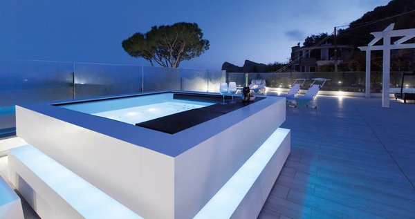 Rooftop Spa Escape: Modern Minimalism Meets Open Sky for a Stylish, Serene Soak Above the City - Perched high above the cityscape, this rooftop installation redefines the spa experience. Seamlessly integrated into a modern urban setting, the minimalist cube-shaped spa becomes more than a relaxation feature—it becomes a centerpiece of architectural elegance and lifestyle enhancement.
With its clean lines, geometric harmony, and bold presence, the spa reflects a design philosophy rooted in simplicity and sophistication. The cube form is not just aesthetically striking; it’s intentional. It creates a sense of order and tranquility, a visual anchor in a space defined by openness and sky. The monochrome exterior contrasts beautifully with the surrounding textures—wood decking, concrete, or glass railings—making it a perfect fit for contemporary rooftops and penthouse terraces.
This spa installation isn’t just about beauty—it’s about balance. Every feature is designed to enhance both comfort and function. Ergonomic seating offers natural support to the body, encouraging deep relaxation while maintaining a stylish silhouette. The water jets are discreet yet powerful, offering targeted hydrotherapy that relieves stress, soothes muscles, and revitalizes the senses.
Lighting plays a vital role in setting the mood. As day transitions into evening, integrated LED systems create a soft ambient glow, highlighting the contours of the spa and casting reflections across the surface of the water. Whether it’s a solitary soak under the stars or a social gathering at sunset, the atmosphere is always elevated—serene, luxurious, and unforgettable.
Positioned against an open sky, with panoramic views stretching in every direction, the rooftop spa blurs the line between indoors and out, private and public, relaxation and inspiration. It's a statement of lifestyle—one where wellness isn’t confined to the bathroom or hidden in a backyard corner, but celebrated at the forefront of living.
This space is an escape, but also a destination. It invites you to pause, breathe, and reconnect. Far from the chaos below, the rooftop spa becomes your sanctuary in the sky—a place to soak in silence, to watch the clouds drift by, to find peace at the edge of architecture.
Whether you’re enjoying an early morning dip with the sunrise or winding down after a long day with city lights sparkling around you, the experience is always transformative. Every element—from the spa’s modern contours to the calming sound of water—contributes to an environment of pure, elevated comfort. Rooftop Spa Escape: Modern Minimalism Meets Open Sky for a Stylish, Serene Soak Above the City - Perched high above the cityscape, this rooftop installation redefines the spa experience. Seamlessly integrated into a modern urban setting, the minimalist cube-shaped spa becomes more than a relaxation feature—it becomes a centerpiece of architectural elegance and lifestyle enhancement.
With its clean lines, geometric harmony, and bold presence, the spa reflects a design philosophy rooted in simplicity and sophistication. The cube form is not just aesthetically striking; it’s intentional. It creates a sense of order and tranquility, a visual anchor in a space defined by openness and sky. The monochrome exterior contrasts beautifully with the surrounding textures—wood decking, concrete, or glass railings—making it a perfect fit for contemporary rooftops and penthouse terraces.
This spa installation isn’t just about beauty—it’s about balance. Every feature is designed to enhance both comfort and function. Ergonomic seating offers natural support to the body, encouraging deep relaxation while maintaining a stylish silhouette. The water jets are discreet yet powerful, offering targeted hydrotherapy that relieves stress, soothes muscles, and revitalizes the senses.
Lighting plays a vital role in setting the mood. As day transitions into evening, integrated LED systems create a soft ambient glow, highlighting the contours of the spa and casting reflections across the surface of the water. Whether it’s a solitary soak under the stars or a social gathering at sunset, the atmosphere is always elevated—serene, luxurious, and unforgettable.
Positioned against an open sky, with panoramic views stretching in every direction, the rooftop spa blurs the line between indoors and out, private and public, relaxation and inspiration. It's a statement of lifestyle—one where wellness isn’t confined to the bathroom or hidden in a backyard corner, but celebrated at the forefront of living.
This space is an escape, but also a destination. It invites you to pause, breathe, and reconnect. Far from the chaos below, the rooftop spa becomes your sanctuary in the sky—a place to soak in silence, to watch the clouds drift by, to find peace at the edge of architecture.
Whether you’re enjoying an early morning dip with the sunrise or winding down after a long day with city lights sparkling around you, the experience is always transformative. Every element—from the spa’s modern contours to the calming sound of water—contributes to an environment of pure, elevated comfort.