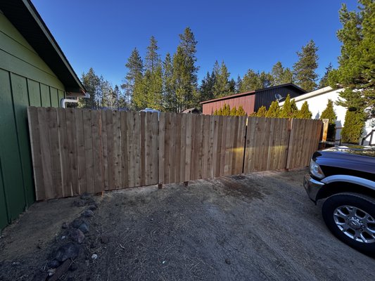 Privacy fence - We installed a 6ft cedar picket privacy fence with pressure treated 4x4 posts. Our customer was thrilled we also installed double 6ft gates for a 12ft opening as well as a 4ft man gate, one on either side of the house!