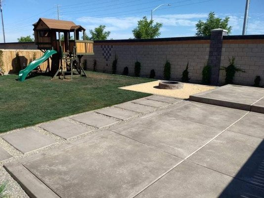 Concrete pad - We created a raised concrete pad for a hot tub, a few stepping pads, a large pad, curbing along the yard and sidewalk. Concrete pad - We created a raised concrete pad for a hot tub, a few stepping pads, a large pad, curbing along the yard and sidewalk.