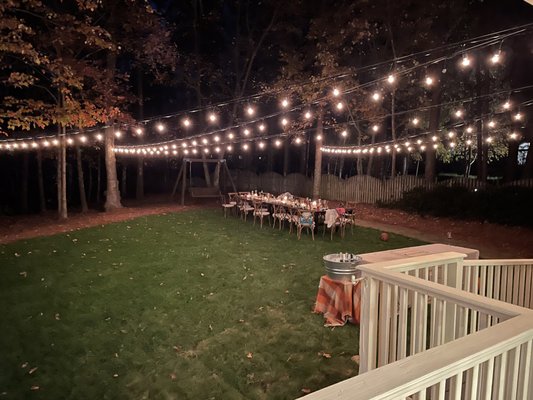 Yard Bistro lights - this family wanted to entertain outside much more especially for an upcoming large dinner, what better way to light the yard with the soft glow of bistro lights! Yard Bistro lights - this family wanted to entertain outside much more especially for an upcoming large dinner, what better way to light the yard with the soft glow of bistro lights!