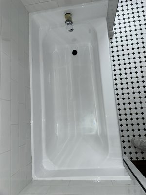 Fiberglass tub repair - A fiberglass tub was repaired and reglaze ! Let me know what you think