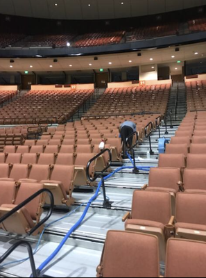 Remember the Erwin Center? - The Steam Team was honored to provide professional upholstery and carpet cleaning services for the Frank C. Erwin Jr. Center, one of the most iconic and emotionally significant buildings in Austin’s history. For more than four decades, the Erwin Center—affectionately known as “The Drum”—stood at the heart of the University of Texas campus and the city itself, hosting countless moments that shaped Austin’s cultural, athletic, and civic identity.

Opened in 1977, the Erwin Center quickly became a cornerstone of Austin life. It served as the longtime home of Texas Longhorns men’s basketball, where generations of fans packed the stands in burnt orange, creating an atmosphere that echoed far beyond the arena walls. Beyond sports, the Erwin Center welcomed world-class concerts, major touring acts, graduations, political events, and community gatherings, making it a shared experience point for students, alumni, and Austinites alike. For many, walking through its doors marked milestones—first concerts, college commencements, championship seasons, and unforgettable nights downtown.

Maintaining and cleaning a facility of this scale required experience, planning, and precision. With thousands of attendees passing through during events, the building demanded professional care for high-traffic flooring, seating areas, concourses, restrooms, and back-of-house spaces. The Steam Team approached the project with the understanding that this was more than just another large commercial building—it was a landmark filled with memories. Our crews utilized industrial-grade equipment and proven cleaning methods to ensure the upholstery and carpets were properly cared for, safe, and presentable during its final years of operation.

As the Erwin Center entered its closing chapter and eventual demolition to make way for future development on the UT campus, cleaning took on an even greater importance. Dust control, surface preparation, and careful attention to aging materials were essential in supporting a safe transition during the building’s decommissioning. The Steam Team worked with professionalism and respect, recognizing that this was the end of an era for many who had walked its halls over the years.

For a company deeply rooted in Austin, being entrusted with work inside the Erwin Center carried special meaning. Like so many locals, members of our team had personal memories tied to the building—Longhorn games, concerts, graduations, and events that defined different stages of life in the city. To help care for such a storied venue was both a responsibility and an honor.

The Erwin Center may no longer stand, but its legacy remains firmly embedded in Austin’s history. The Steam Team is proud to have played a small role in the stewardship of a building that meant so much to the University of Texas and the greater Austin community. Projects like this reflect our long-standing commitment to quality workmanship, respect for local landmarks, and service to the city we’ve called home for decades.