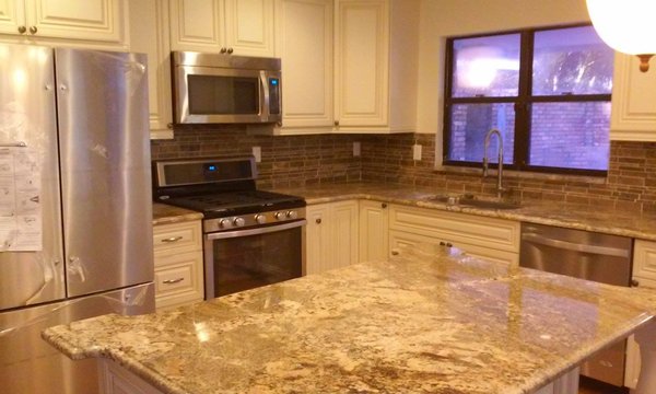 Backsplash (2023) - My client wanted to renovate her kitchen but keep the elegant look it has from the cabinets and accessories. We decided a beautiful kitchen improvement done with a new backsplash. We decided on this chic brick imitation backsplash to complete the look. Backsplash (2023) - My client wanted to renovate her kitchen but keep the elegant look it has from the cabinets and accessories. We decided a beautiful kitchen improvement done with a new backsplash. We decided on this chic brick imitation backsplash to complete the look.