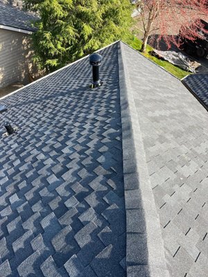 Dean's New Roof - The customer contacted us with concerns about their aging rooftop. Together, we concluded that the right move would be a complete roof replacement on their lovely home. We used Charcoal GAF Grand Sequoia shingles which are top-notch, undeniably durable and absolutely to die for. They've added quite the charm to the home's overall curb appeal.