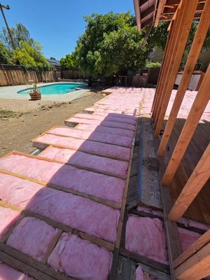 Subfloor Insulation - This is a subfloor where we installed new insulation with netting before carpenters installed play wood floor Subfloor Insulation - This is a subfloor where we installed new insulation with netting before carpenters installed play wood floor