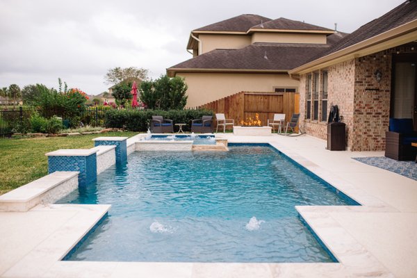 Luxury Linear Pool/Spa - Avree Custom Pools has been creating backyard retreats for decades, transforming outdoor spaces into an oasis that can be enjoyed year-round. Designing and building projects that fit your lifestyle and unique preferences with excellence is our mission.