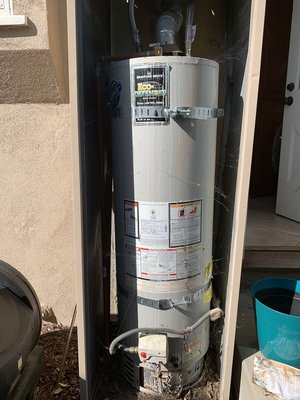 Tank to Tankless - Customer called us because he was having trouble lighting his water heater. Upon arrival to inspect the water heater, our technician noticed that the water heater was not installed up to code. We noticed the unit was installed in between a door and window and the biggest issue was the exhaust which is supposed to pass the roof line. We informed the owner that the only way we would work on it was if it was relocated. The perfect wall was about 20 feet from it's original installation. Tank to Tankless - Customer called us because he was having trouble lighting his water heater. Upon arrival to inspect the water heater, our technician noticed that the water heater was not installed up to code. We noticed the unit was installed in between a door and window and the biggest issue was the exhaust which is supposed to pass the roof line. We informed the owner that the only way we would work on it was if it was relocated. The perfect wall was about 20 feet from it's original installation.
