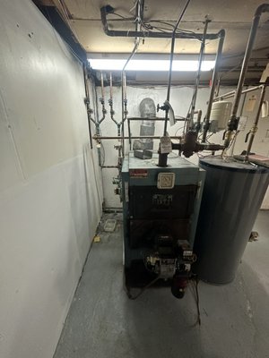 Emergency boiler installed,Burnham oil boiler hot water, with limited lifetime warranty superstore domestic hot water tank. - Emergency boiler installation we get it done immediately. Have access to multiple suppliers. Can offer the best price even in Emergency. This is a Burnham oil, hot water boiler install,with  a domestic hot water HTP limited lifetime warranty  tank . 4-zone heating with easy future service access we hand the job completely no need to hire any outside source.. ￼￼￼