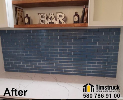 Kitchen backsplash replacement - Replacement of the bar splash shield. Just look at what a beauty it turned out! Call us and we will help you with any home repair work!