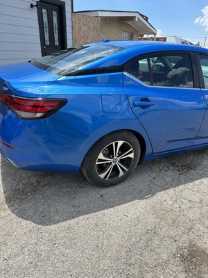 2023 Nissan Sentra SV - This Sentra came in about a week ago. Had been hit on the passenger side. We had to replace both doors since they were damaged beyond repair. Also had damage to the rear quarter panel. After some straightening, replacing the doors and paint job. We had to blend the other parts with paint to make the older paint match the new paint. At the end of it all , another happy customer... 2023 Nissan Sentra SV - This Sentra came in about a week ago. Had been hit on the passenger side. We had to replace both doors since they were damaged beyond repair. Also had damage to the rear quarter panel. After some straightening, replacing the doors and paint job. We had to blend the other parts with paint to make the older paint match the new paint. At the end of it all , another happy customer...