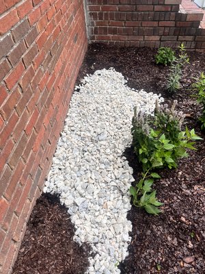Flower bed and mulch - At this job one of our customers wanted us to plant some flowers they bought as well and lay some mulch surrounding them and going all throughout the flower bed. We also a added some stone in two places due to water erosion Flower bed and mulch - At this job one of our customers wanted us to plant some flowers they bought as well and lay some mulch surrounding them and going all throughout the flower bed. We also a added some stone in two places due to water erosion
