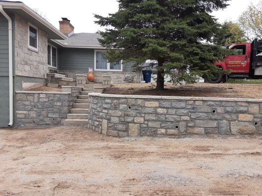 Stone Retaining walls, Flagstone & Veneer Stone on home. - Looking for a professional stone masonry company give us a call at 816/838-3817. Stone Retaining walls, Flagstone & Veneer Stone on home. - Looking for a professional stone masonry company give us a call at 816/838-3817.