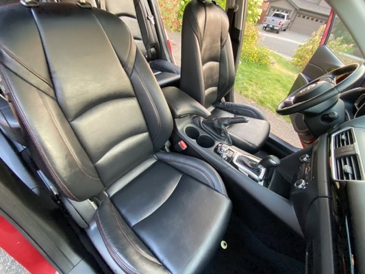 Top Shelf Interior Detail - This Interior only detail required extensive vacuuming of not only the floorboards but in the seats seams and cracks, as well as various spills that needed steam to remove. Plastics and trim were scrubbed with a lightly diluted APC and scrubbed with a brush and steamed before being wiped clean and finally protectant was applied. Vehicle was also treated with an ozone generator and light scent added. All Jambs were cleaned and steamed to enhance the clean interiors look since there was no exterior detail but wanted to make the openings pop and shine to frame the lustrous look of leather and dark carpet
