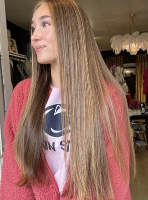 Partial Highlight - What a beauty! Our stylist did a partial foil to brighten our clients hair, giving her a new bright look for summer!