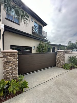 New front sliding and entrance gate - Custom Sliding Gate & Pedestrian Gate – Solana Beach, CA
Another beautiful custom gate project completed in Solana Beach! Our customer wanted a custom sliding gate and matching pedestrian gate designed to complement the front of their home while enhancing security and curb appeal.
Both gates were custom fabricated to the customer’s approved design. We used hot-dip galvanized steel for superior rust protection, followed by a premium powder-coated finish for long-lasting durability and a clean, elegant appearance.
To complete the project, we installed high-quality wood composite panels that provide the warm look of natural wood without the ongoing maintenance, warping, or rotting associated with traditional wood gates.
At ProTex Access Garage Door & Gate Repair, we build custom gates that combine durability, functionality, and beautiful craftsmanship to last for years. New front sliding and entrance gate - Custom Sliding Gate & Pedestrian Gate – Solana Beach, CA
Another beautiful custom gate project completed in Solana Beach! Our customer wanted a custom sliding gate and matching pedestrian gate designed to complement the front of their home while enhancing security and curb appeal.
Both gates were custom fabricated to the customer’s approved design. We used hot-dip galvanized steel for superior rust protection, followed by a premium powder-coated finish for long-lasting durability and a clean, elegant appearance.
To complete the project, we installed high-quality wood composite panels that provide the warm look of natural wood without the ongoing maintenance, warping, or rotting associated with traditional wood gates.
At ProTex Access Garage Door & Gate Repair, we build custom gates that combine durability, functionality, and beautiful craftsmanship to last for years.