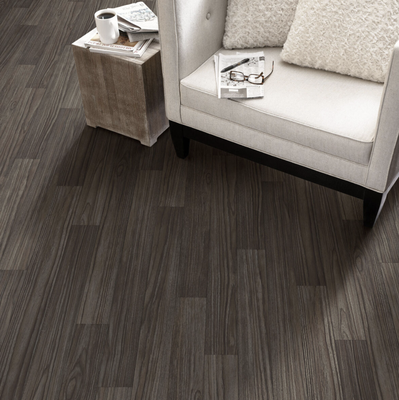 LUXURY VINYL FLOORING - Luxury vinyl plank flooring (LVP) is a type of resilient flooring that combines the best features of both hardwood and laminate floors. LVP is made from multiple layers of different materials that are bonded together under high pressure and heat. The top layer is a clear wear layer that protects the design layer below.

Luxury vinyl flooring is one of the most popular types of flooring on the market today. It is durable, easy to maintain, and provides a beautiful finish to any home. Custom Floor and Design offers a wide variety of luxury vinyl flooring options to choose from, so you can find the perfect match for your home’s style and décor.