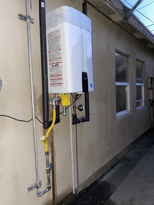 Exterior Navian tankless installation - Tankless installation Exterior Navian tankless installation - Tankless installation