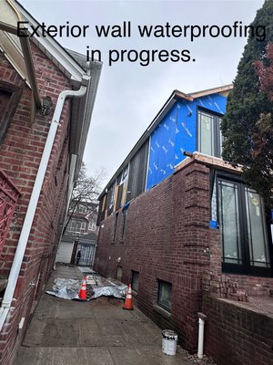 Exterior wall waterproofing. - Exterior walls repair and waterproofing work in progress. Exterior wall waterproofing. - Exterior walls repair and waterproofing work in progress.