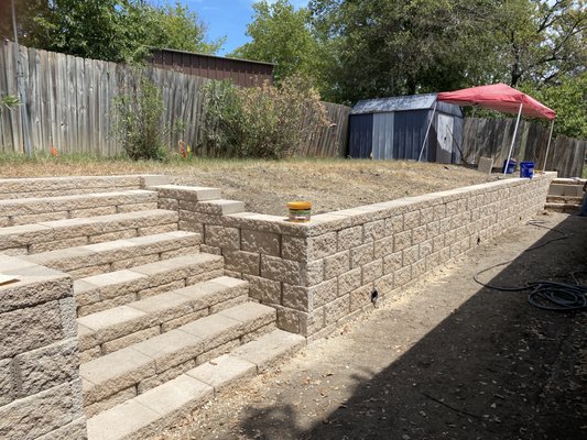 Retaining wall and stair rebuild - Old failing stairs and retaining wall replaced with beautiful, functional and space saving retaining wall system Retaining wall and stair rebuild - Old failing stairs and retaining wall replaced with beautiful, functional and space saving retaining wall system