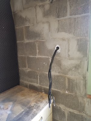 Garage wiring repairs. - The home was being placed on the market, but the live wires found in the garage were dangerous and needed to be repaired immediately. We went out and terminated the wiring in a sub panel and made it ready for future circuits in the garage.