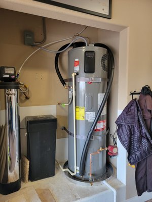 Electric Hybrid Water Installation - An electric hybrid water heater, also known as a heat pump water heater, combines conventional electric water heating with advanced heat pump technology. It is designed to be highly energy-efficient, using electricity to move heat from the surrounding air into the water, rather than generating heat directly.
Electric Hybrid water heaters extract heat from ambient air and transfers it to the water, which is more efficient than using electric resistance heating elements alone.
An electric hybrid water heater is a great option for homeowners seeking an environmentally friendly and cost-effective solution for their hot water needs. Electric Hybrid Water Installation - An electric hybrid water heater, also known as a heat pump water heater, combines conventional electric water heating with advanced heat pump technology. It is designed to be highly energy-efficient, using electricity to move heat from the surrounding air into the water, rather than generating heat directly.
Electric Hybrid water heaters extract heat from ambient air and transfers it to the water, which is more efficient than using electric resistance heating elements alone.
An electric hybrid water heater is a great option for homeowners seeking an environmentally friendly and cost-effective solution for their hot water needs.