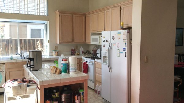 San Jose Kitchen Remodel - Open concept kitchen is the picture of pristine bathed in natural light with white finishes throughout to create a crisp and atmospheric space