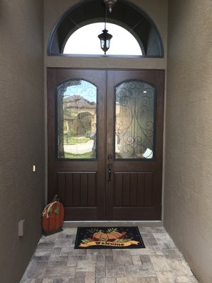 Glass Insert on a solid Fiberglass Door - We could use the existing Slab Doors. The top panel was cut out and the glass insert installed. This is the really good solution if your Entry frame and slab doors are in a good condition, but you just need a new and fresh look with additional Light coming through the entrance. It is a really budget friendly way to change the Entry Look. Glass Insert on a solid Fiberglass Door - We could use the existing Slab Doors. The top panel was cut out and the glass insert installed. This is the really good solution if your Entry frame and slab doors are in a good condition, but you just need a new and fresh look with additional Light coming through the entrance. It is a really budget friendly way to change the Entry Look.