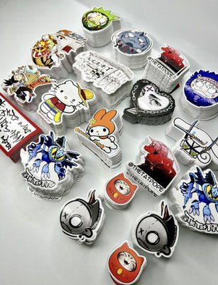 Custom Uv Stickers - We specialize in custom, high-quality die-cut UV stickers with embossed gloss that adds the perfect standout touch.
Whether it’s for branding, packaging, or promotions — our stickers aren’t just printed, they pop. Crisp cuts, deep gloss, and unmatched quality — made to impress.