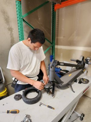 Scooter Repair - At AIC Motorsports, we have professional technicians who specialize in e-scooter, e-bike, and dirt bike repair. Here are some of us at work! Scooter Repair - At AIC Motorsports, we have professional technicians who specialize in e-scooter, e-bike, and dirt bike repair. Here are some of us at work!