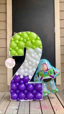 TWO Infinity and Beyond - TWO Infinity and Beyond 
Balloon Mosaic in the size of 40” (3ft 4inches tall) paired it up with a foil balloon of buz lighter to fit the theme