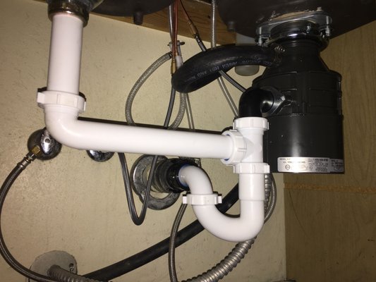 Garbage Disposal Install (The Correct Way) - The customer was having issues with their garbage disposal and sink stoppages. The plumbing before was back-graded (Not Flowing Down Hill) causing the sink to backup and the garbage disposal efficiently went out. After replacing the garbage disposal we went ahead and fixed the incorrect plumbing as well (Free Of Charge) to help out the home owner from having any further issues. Garbage Disposal Install (The Correct Way) - The customer was having issues with their garbage disposal and sink stoppages. The plumbing before was back-graded (Not Flowing Down Hill) causing the sink to backup and the garbage disposal efficiently went out. After replacing the garbage disposal we went ahead and fixed the incorrect plumbing as well (Free Of Charge) to help out the home owner from having any further issues.